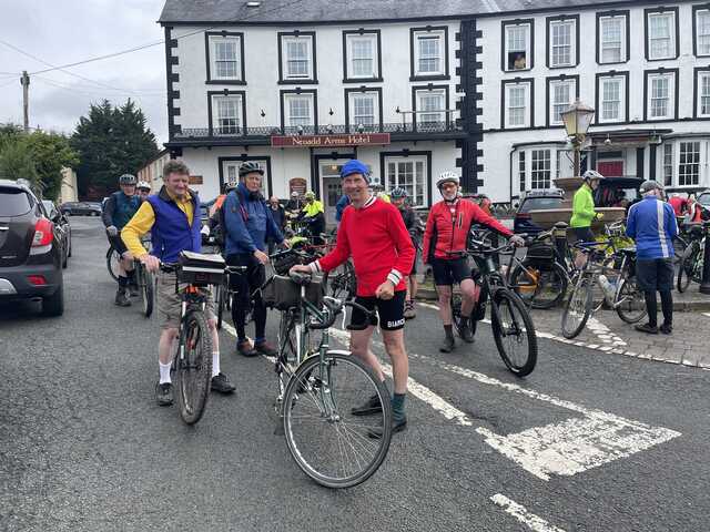 683a2ba6e1773 cyclist in front of neuadd arms
